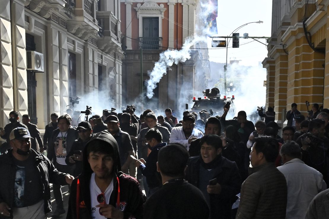 Military troops fire tear gas at people outside the Quemado Palace at the Plaza Murillo in La Paz on June 26, 2024.