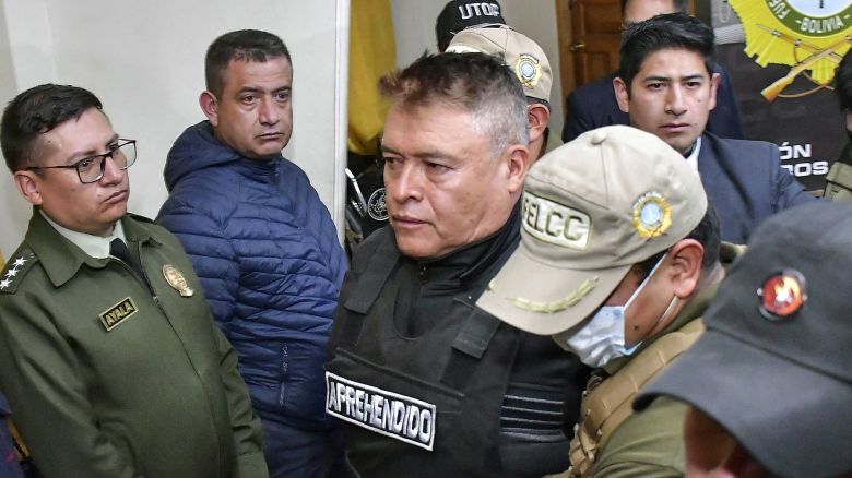 Now-dismissed Bolivian army chief General Juan Jose Zuniga is escorted by policemen following his arrest, after he led a military movement which attempted to seize the government palace by force, in La Paz, on June 26, 2024.