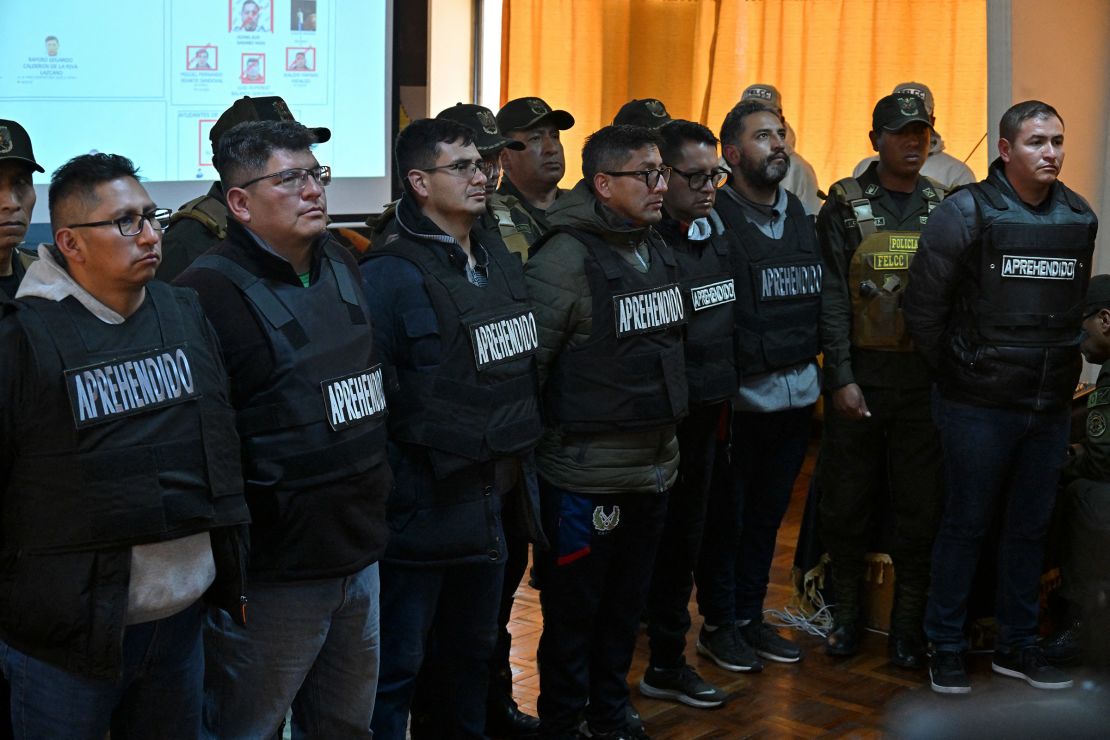 Multiple Bolivian military members are escorted by police following their arrest in La Paz, Bolivia on June 27, 2024.