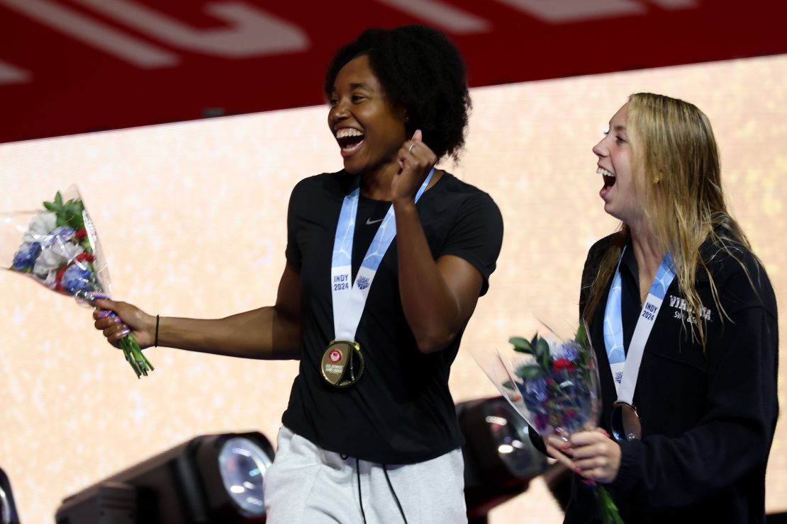 Manuel receives her 50m freestyle medal alongside Gretchen Walsh.