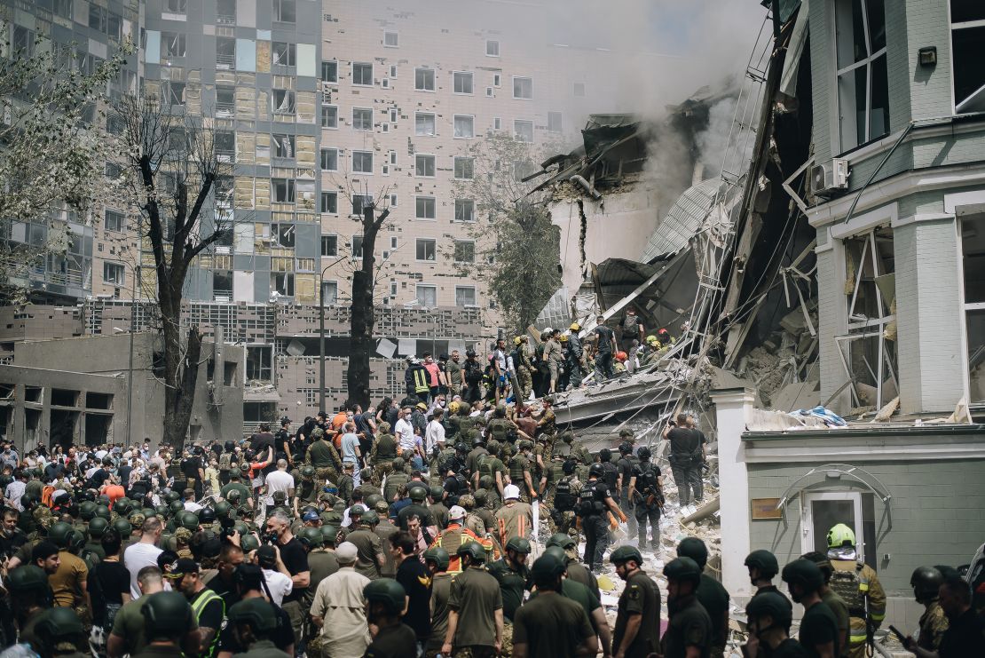 KYIV, UKRAINE - JULY 8: People clear rubble from a building of one of the largest children’s hospitals of Ukraine, ‘Okhmatdyt’, partially destroyed by a Russian missile strike on July 8, 2024 in Kyiv, Ukraine. In the morning, the Russian army carried out a mass missile attack on the Ukrainian cities of Kyiv, Dnipro, Kryvyi Rih, Sloviansk, Kramatorsk, using more than 40 missiles of various types. In Kyiv, residential buildings, infrastructure facilities and children’s hospital ‘Okhmatdyt’ were damaged. Rescuers continue to search for people under the rubble. (Photo by Valentyna Polishchuk/Global Images Ukraine via Getty Images)