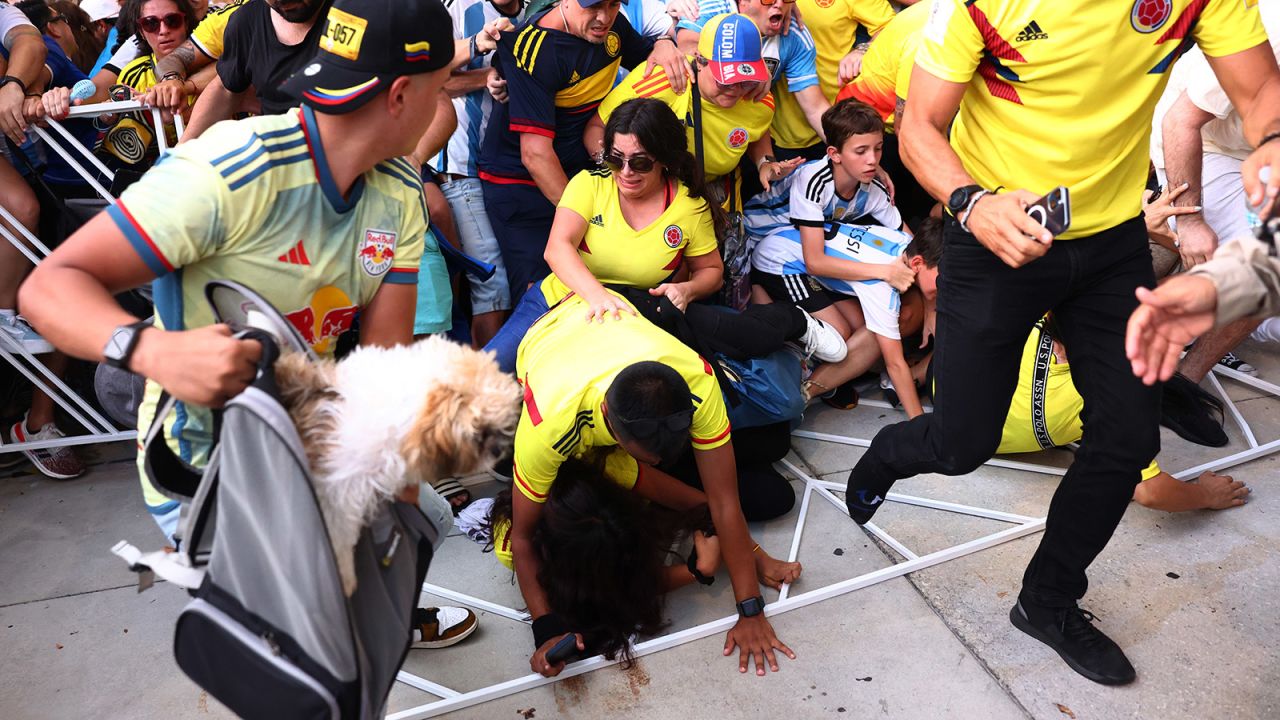 Fans of Colombia and Argentina try to pass the gate amid disturbances the CONMEBOL Copa America 2024 Final match between Argentina and Colombia at Hard Rock Stadium in Miami Gardens, Florida on July 14, 2024.