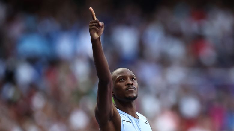 TOPSHOT - Botswana's Letsile Tebogo celebrates after winning the men's 200m final of the athletics event at the Paris 2024 Olympic Games at Stade de France in Saint-Denis, north of Paris, on August 8, 2024. (Photo by Anne-Christine POUJOULAT / AFP) (Photo by ANNE-CHRISTINE POUJOULAT/AFP via Getty Images)