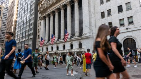 NEW YORK, NEW YORK - AUGUST 14: People walk through the financial district by the New York Stock Exchange (NYSE) on August 14, 2024, in New York City.  According to the Bureau of Labor Statistics’ latest CPI report, consumer prices rose 2.9% in July, slowing from June’s 3% annual gain.  (Photo by Spencer Platt/Getty Images)