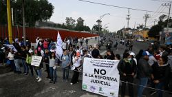 Employees of the Federal Judiciary take part in a protest against judicial reform proposed by the government outside the Mexican Congress in Mexico City on September 3, 2024. Protesting judicial workers on Tuesday blocked access to Mexico's lower house of Congress to try to prevent a vote on controversial reforms proposed by outgoing President Andres Manuel Lopez Obrador. (Photo by Alfredo ESTRELLA / AFP) (Photo by ALFREDO ESTRELLA/AFP via Getty Images)