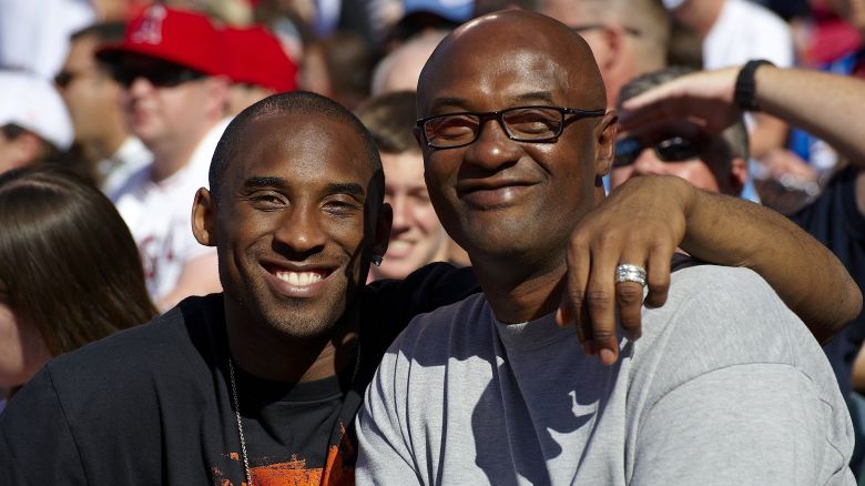 Kobe Bryant poses for a photo with his father Joe Bryant in Anaheim, California, in 2009.