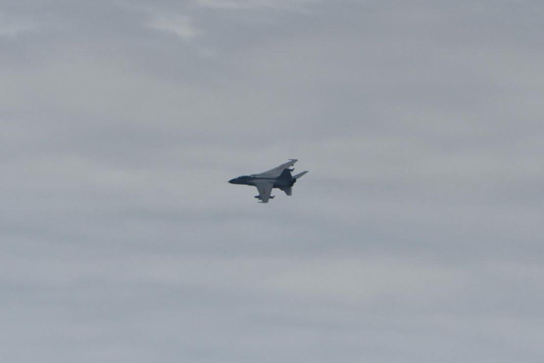 This handout picture shows the Dutch frigate Tromp approached in the East China Sea by a Chinese fighter jet.