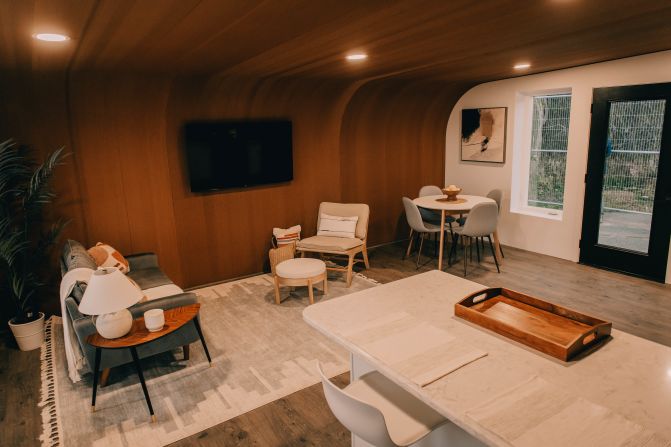 The living room of the BioHome3D. The printed walls give the home a warm and inviting feeling.