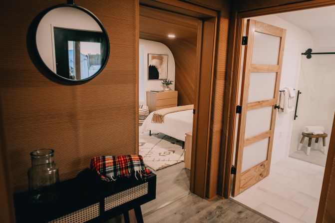 A view into the bedroom and the bathroom of the BioHome3D. The home’s modules were prefabricated, then bolted together on site.