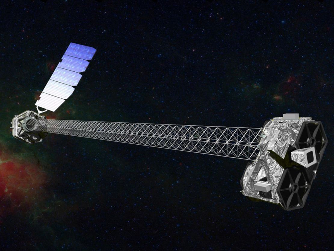 NASA’s space-based NuSTAR telescope, seen here in an artist’s concept, was used for the first time to detect the "plunging region" around a black hole.