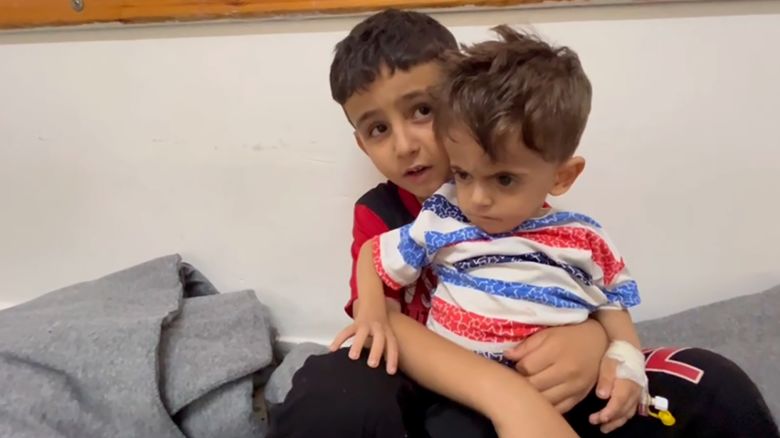 Brothers Amjad, aged 2, and Ahmad, aged 7, are shown in Nasser Hospital, southern Gaza, before their medical evacuation to Egypt.