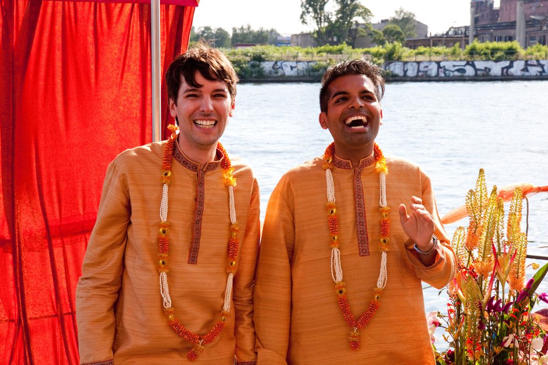 Manuel and Suki arrived at their second wedding celebration by boat.