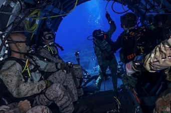 U.S. Marines conduct dive training from USS Georgia (SSGN 729) in the Mediterranean Sea.