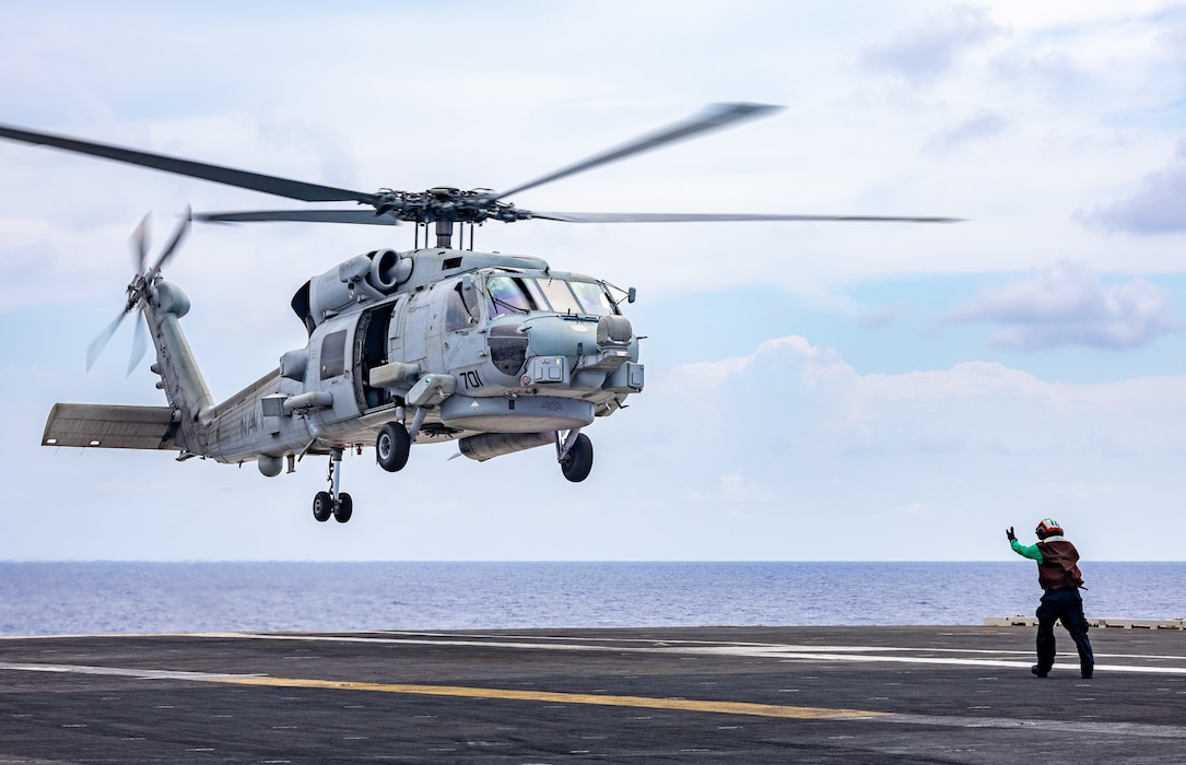 An MH-60R Sea Hawk helicopter from HSM-72 takes off from USS Harry S. Truman (CVN 75) in the Atlantic Ocean.