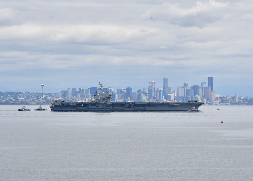 USS Ronald Reagan (CVN 76) transits Puget Sound towards its new homeport at Naval Base Kitsap, Washington.