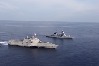 USS Mobile (LCS 26) is underway with BRP Ramon Alcaraz (PS 16) in the South China Sea.