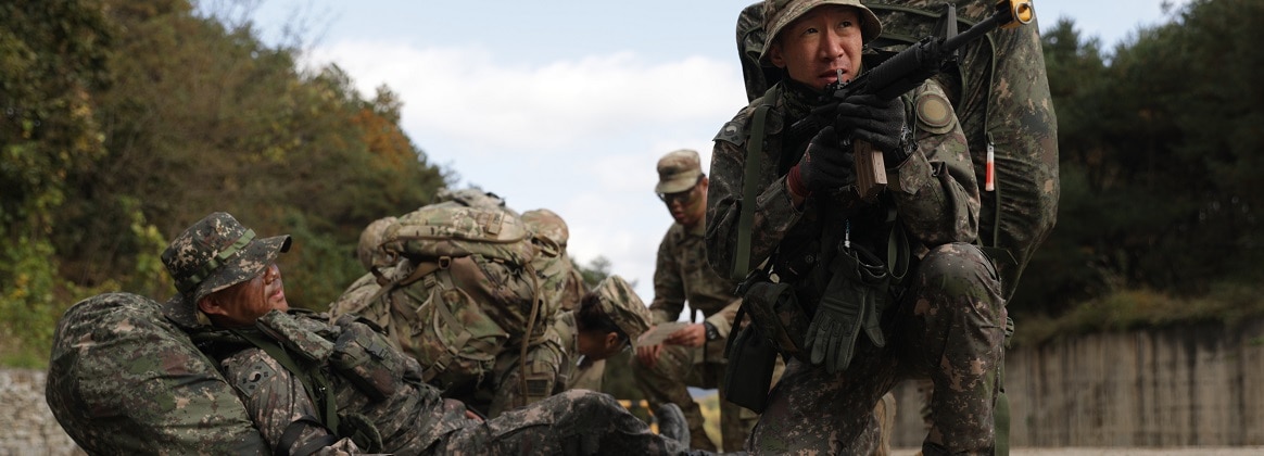 A Republic of Korea Army Soldier pulls security for a wounded team member during a casualty evacuation exercise during Mangudai 2024, October 23,