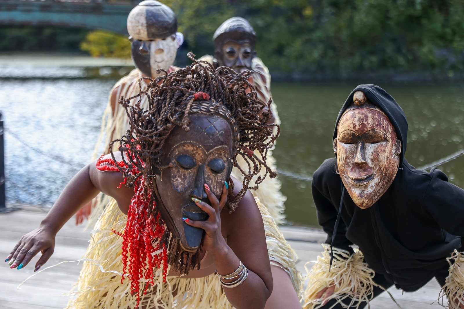 Two people wear masks.