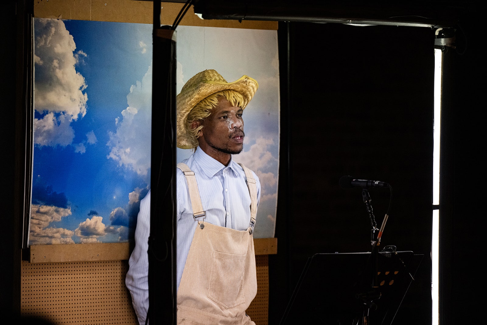 A photo of the actor Siyambonga Alfred Mdubeki in a production of “Dark Noon” at St. Ann's Warehouse in New York City.