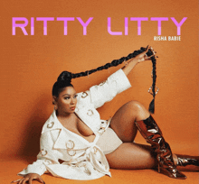 a woman with a braid is on the cover of an album titled ritty litty