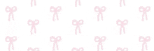 a pattern of pink scissors on a white background