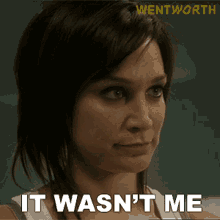 a woman says " it wasn 't me " in front of a wentworth logo