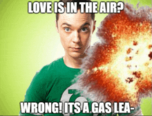 a man in a green shirt is standing in front of an explosion that says love is in the air