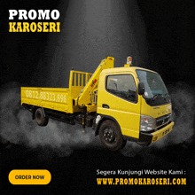 a yellow truck with a crane on the back is advertised as a promo karoseri