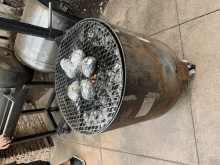 potatoes are being cooked on a grill that says ' texas ' on it