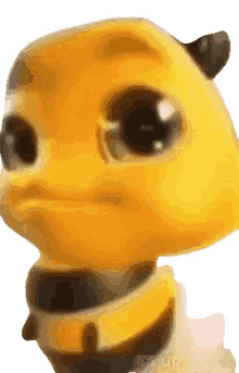 a close up of a yellow cartoon character 's face