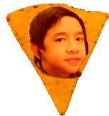 a nacho chip with a child 's face in the middle