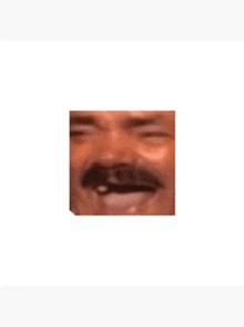 a close up of a man with a mustache laughing on a white background .