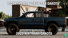 a blue truck with the words i identify as a " crew cab dakota " on the bottom