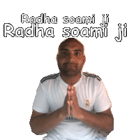 a man wearing a white shirt with the words radha soami ji radha soami ji written above him