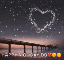 a picture of a pier with a heart in the sky and the words happy monday db