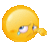 a pixelated smiley face with a crying eye and a tear coming out of it .