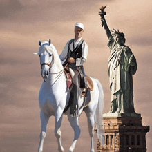 a man riding a white horse in front of a statue of liberty