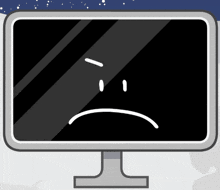 a computer monitor has a sad face on it