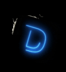 the letter d is glowing in the dark