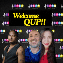 a group of people are standing in front of a welcome qup sign