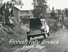 a black and white photo of a finnish rally car