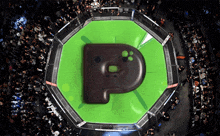 a boxing ring with the letter p in the center