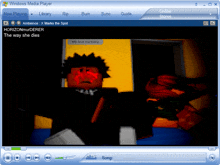 a windows media player displays a video of a man with red eyes