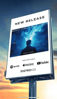 a billboard advertises a new release by hayley rose