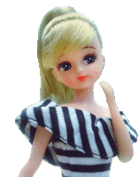 a doll with blonde hair is wearing a striped dress