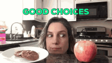 a woman looking at an apple and a plate of cookies with the words " good choices " above her