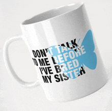 a coffee mug that says " don 't talk to me before i 've bred my sister "