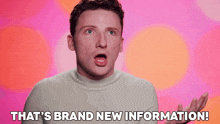 a man says that 's brand new information in front of a pink background