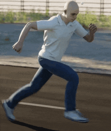 a bald man in a white polo shirt and jeans is running