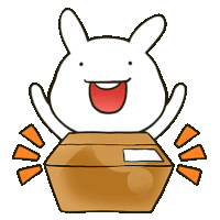 a cartoon bunny is sitting on a cardboard box